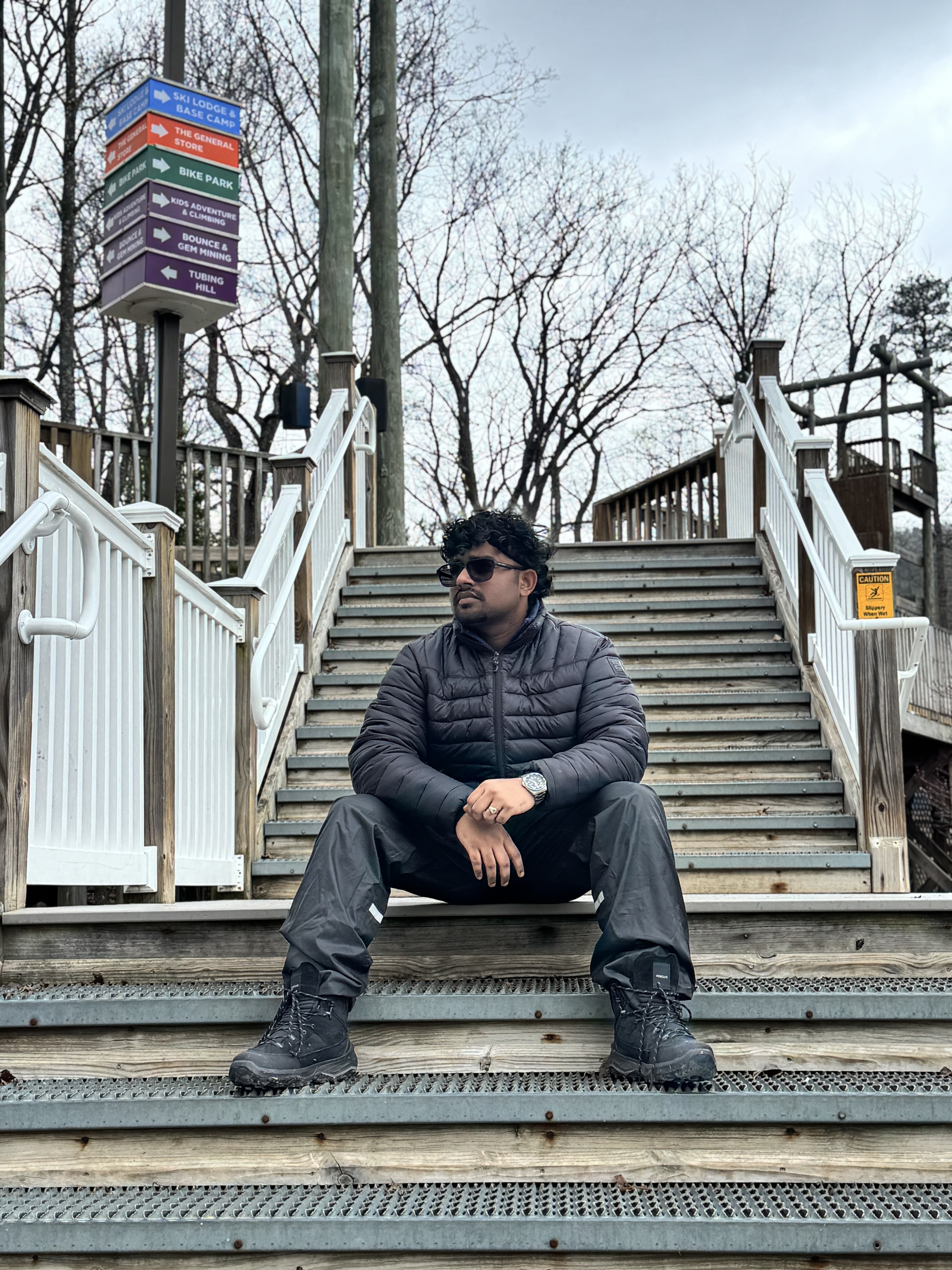 Roshan R Sivakumar sitting and reflecting outdoors in Richmond Virginia