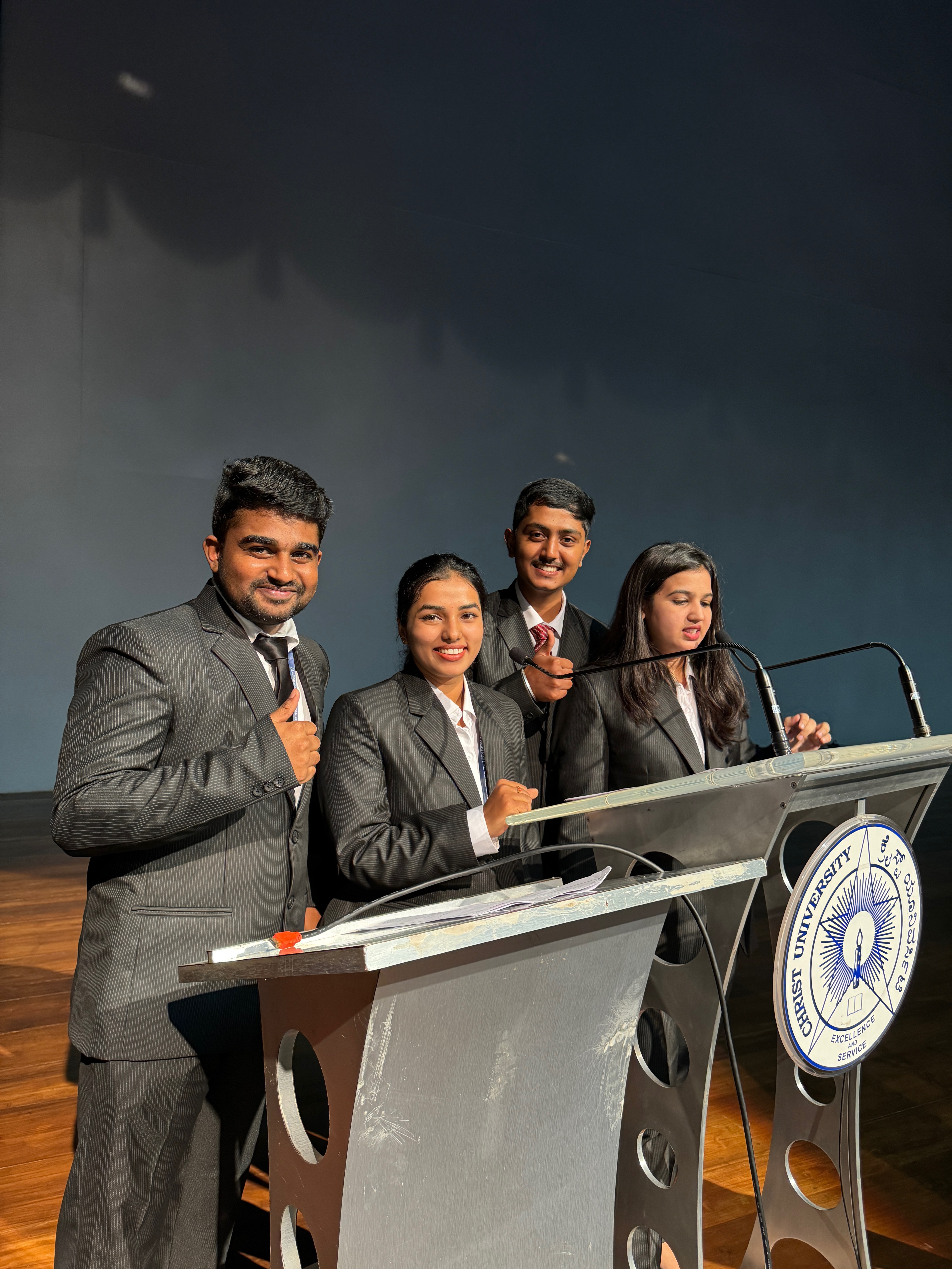 Roshan Rajkumar Sivakumar and Pioneer Club team presenting at official Christ University podium during first Pioneer Club event Bengaluru 2024