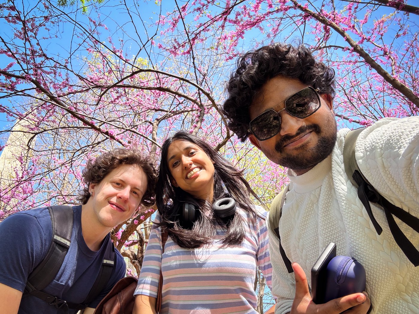 Roshan R Sivakumar with Rilee and Amala selfie under cherry blossom trees at Washington DC, April 5 2026
