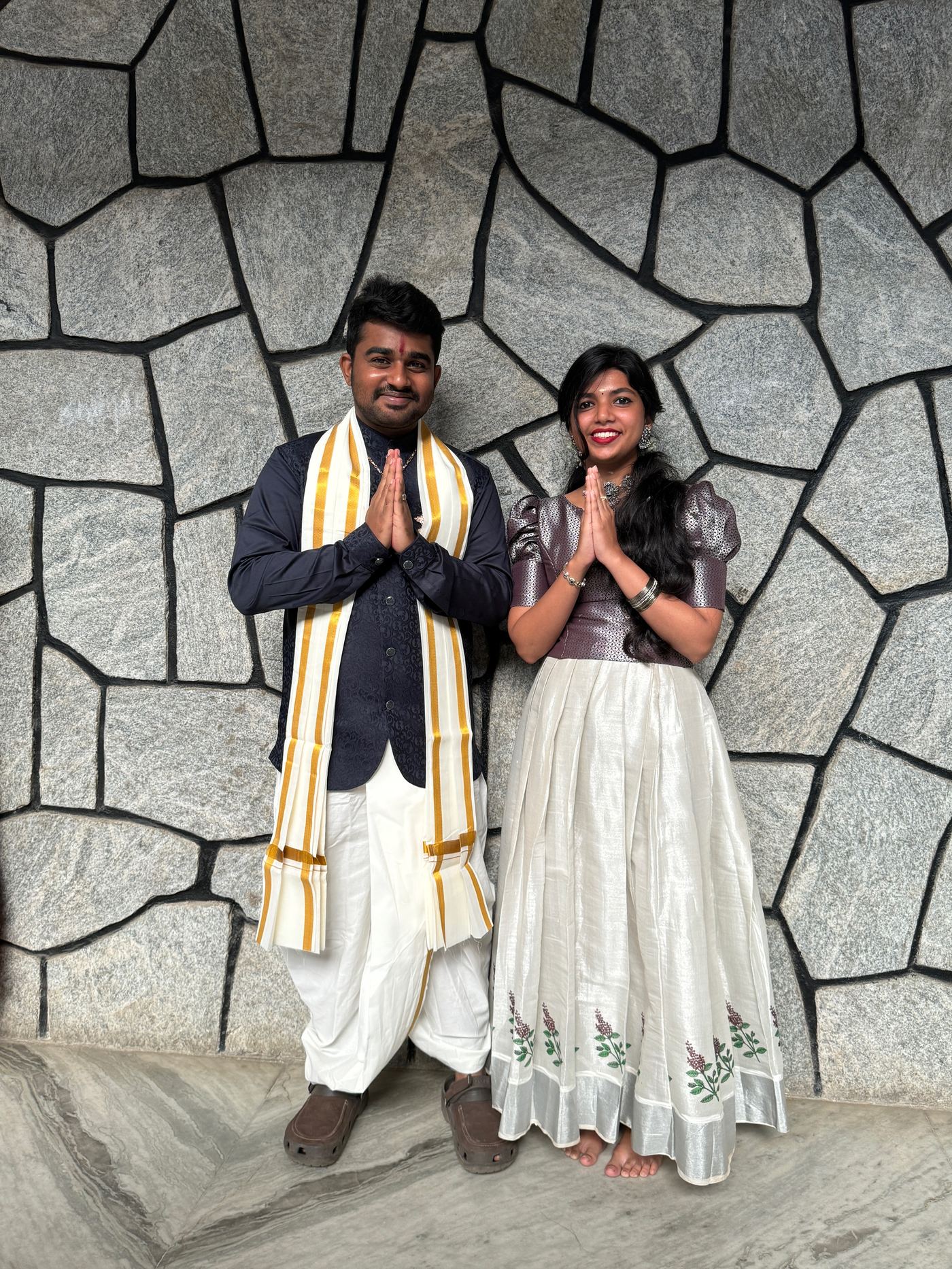 Roshan R Sivakumar in traditional South Indian white veshti and angavastram representing South India at Basha Utsav ethnic day, Christ University Bengaluru