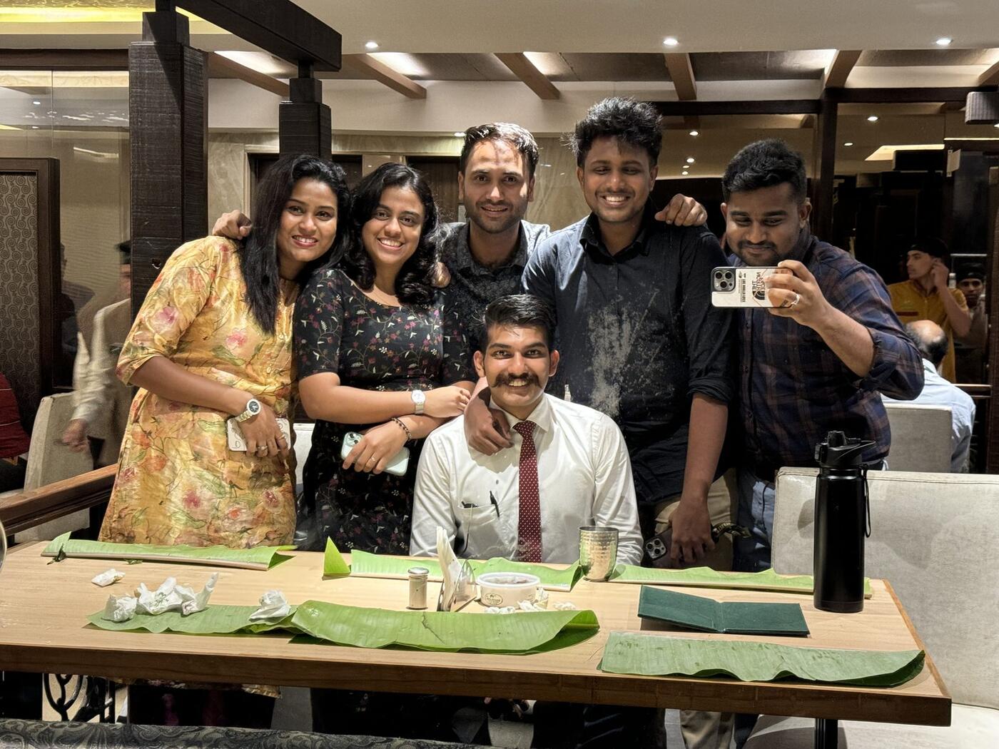 Roshan R Sivakumar celebrating a classmate's birthday with friends at Christ University