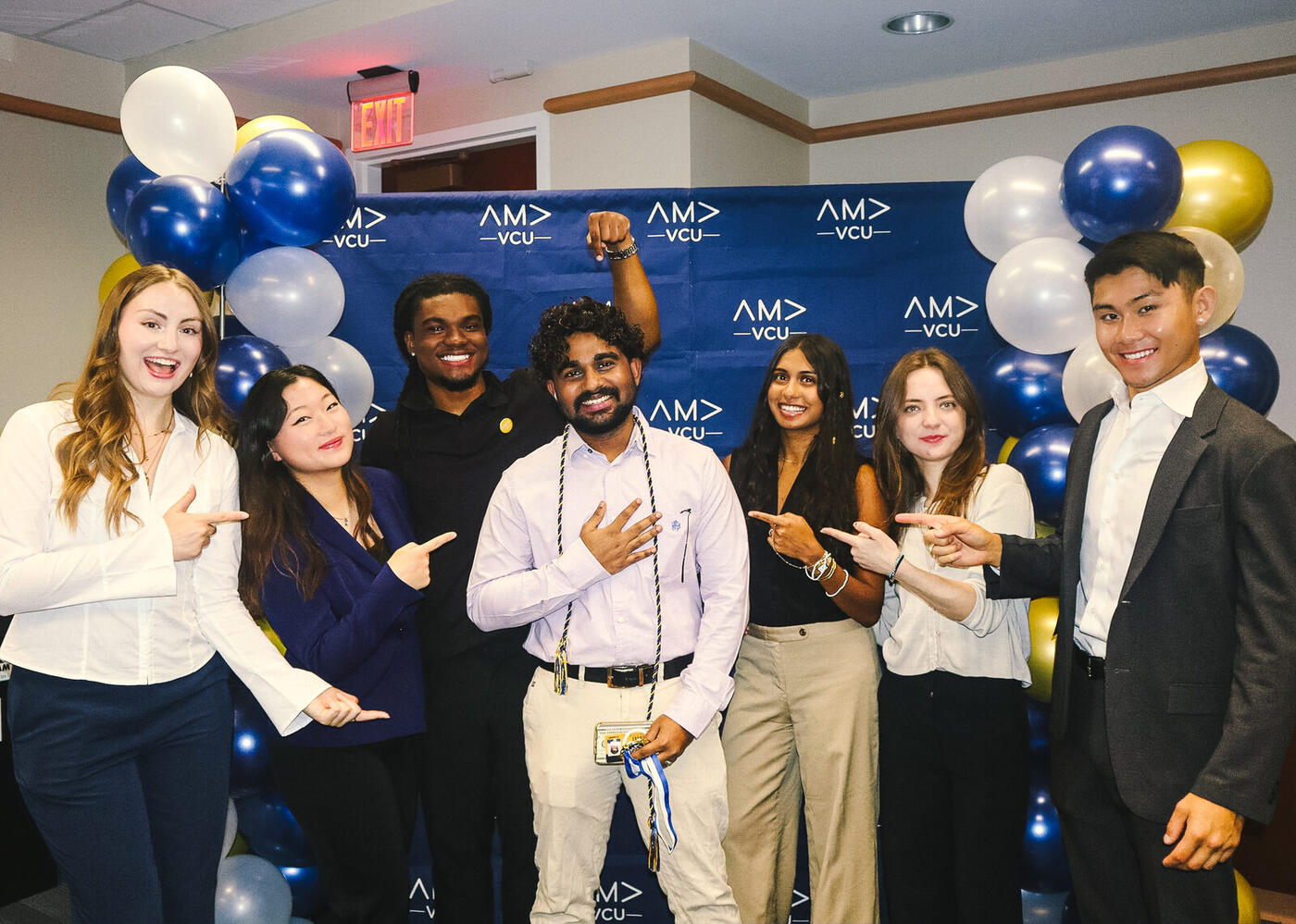 Roshan R Sivakumar with the AMA VCU executive board at spring induction