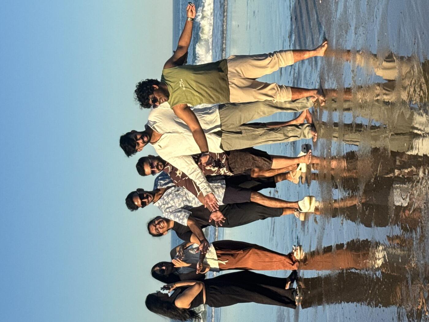 Roshan R Sivakumar with friends on the beach at Outer Banks, North Carolina